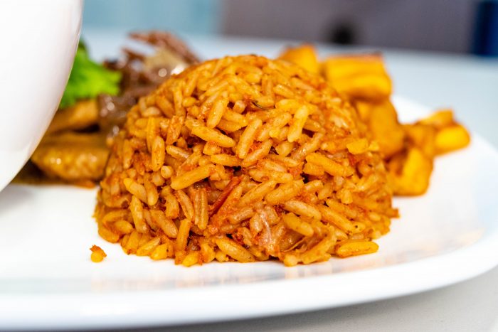 Jollof rice dome in a white plate