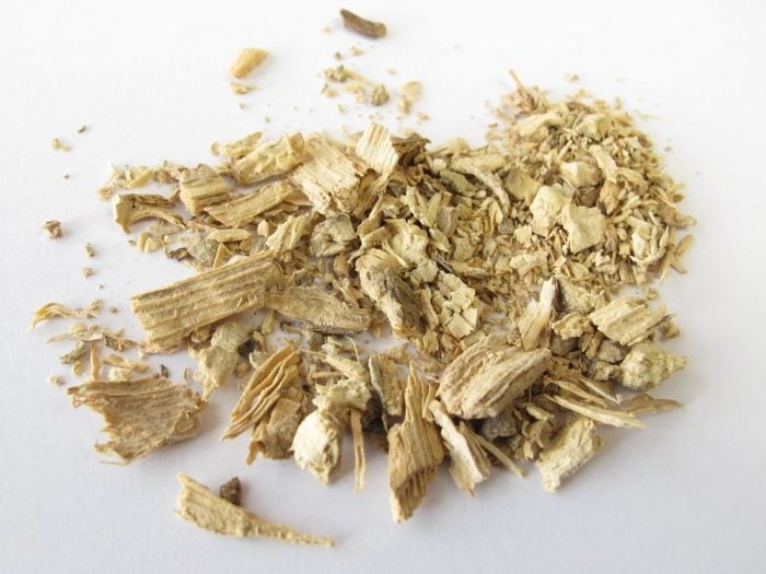 Close up of dried kava root on a white background