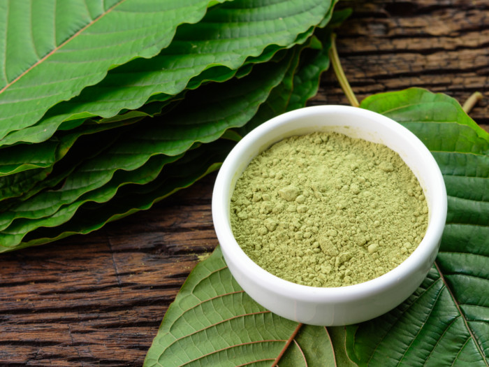 Kratom powder in a bowl