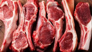 Raw meat kept atop a wooden table
