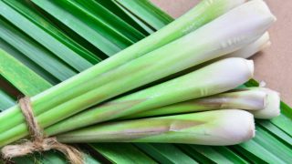 Lemongrass leaves on a wooden table