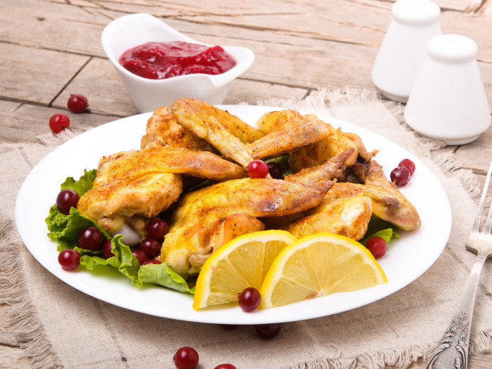 Grilled chicken lemon pepper wings on a plate