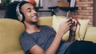 Man listening to music on headphones
