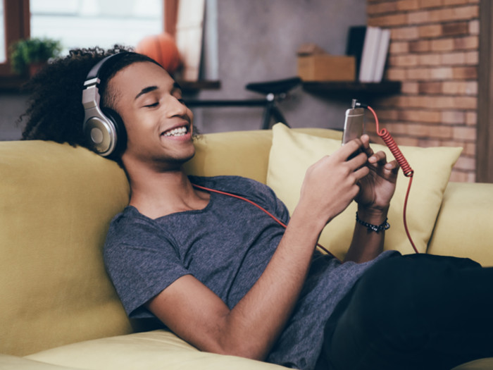 Man listening to music on headphones