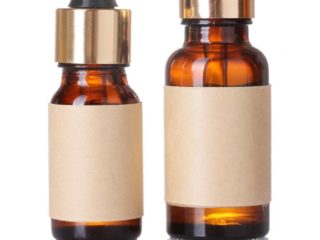 magnesiumoil Close up of bottles of essential oil on a white background