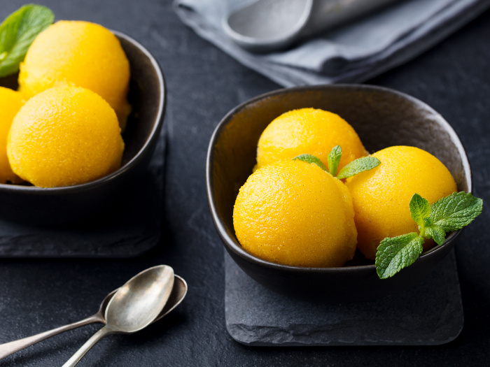 Two bowls of mango sorbet