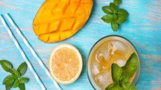 A flat lay picture of iced mango tea