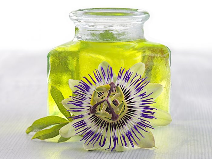 A close-up shot of maracuja flower and oil