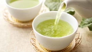 Tea being poured into a cup