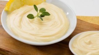 A flat bowl filled with mayonnasie