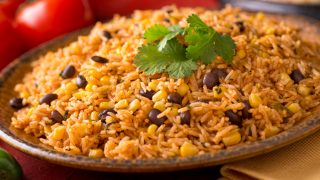A plate of delicious authentic Mexican Rice with black beans, corn, garlic, and cilantro