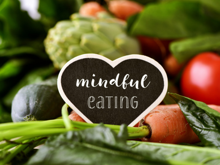 A picture of mindful eating written on a black heart