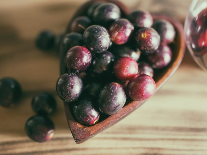 A close-up shot of muscadine grapes