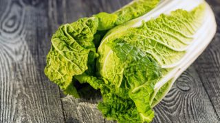 Napa or Chinese cabbage on wooden background