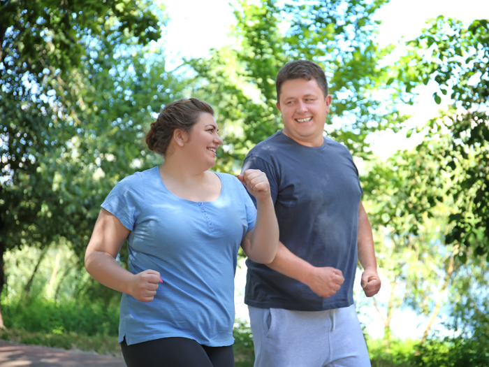 Couple running in the park