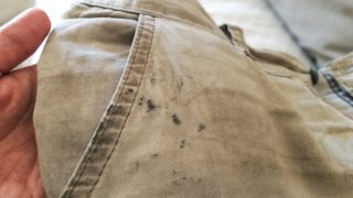 Oil stain or grease stain on clothes.
