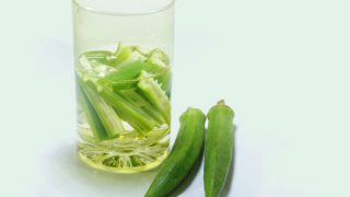 Okra water in a glass and okra kept near it