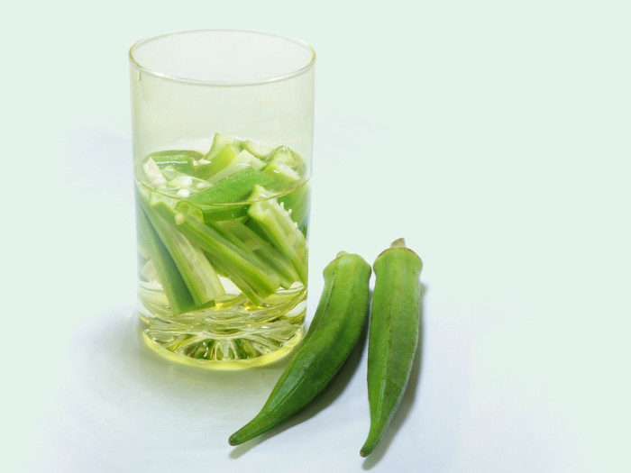 Okra water in a glass and okra kept near it