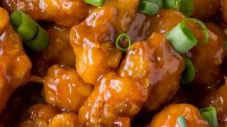 A close up shot of orange chicken