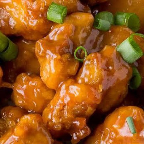 A close up shot of orange chicken