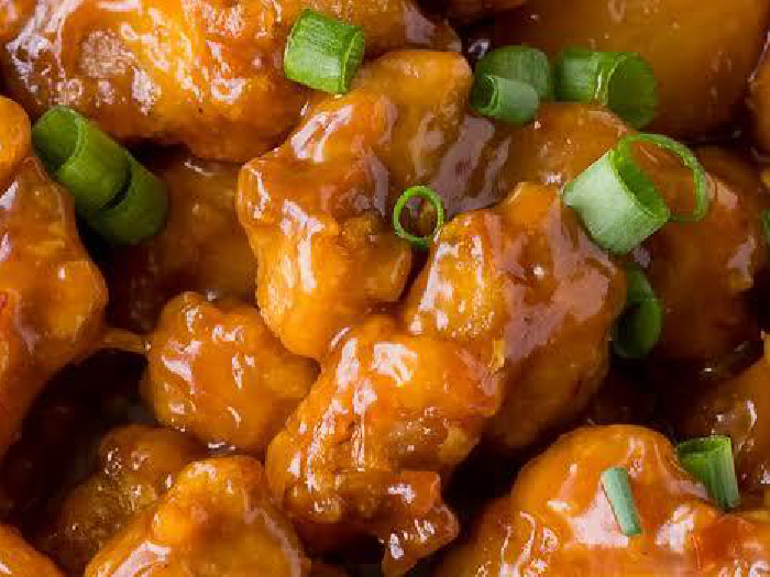 A close up shot of orange chicken