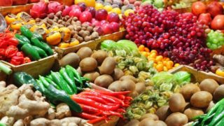 Fresh fruits and vegetables in market crates
