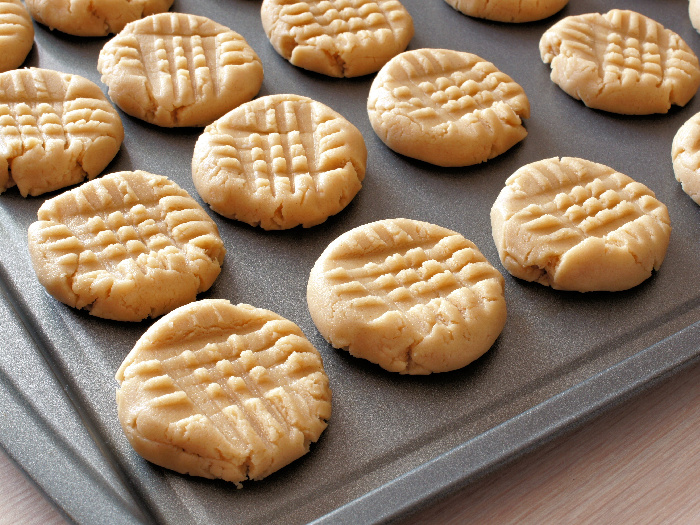 Baked peanut butter cookies in a baking tray