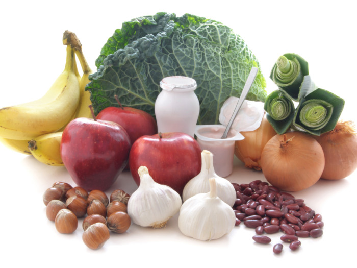 Prebiotic foods like bananas, apples, garlic, chestnuts, red beans, onions, and yogurt