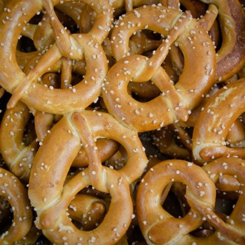 Soft, salted pretzels stacked on one another