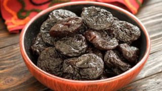 Close-up of a bowl full of prunes