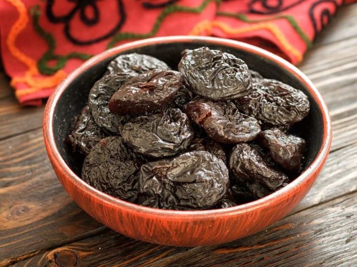 Close-up of a bowl full of prunes