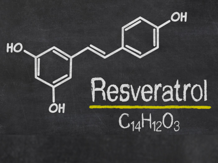 Chemical structure of resveratrol on a grey background