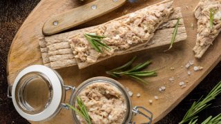 Tuna pate with egg, cheese in a jar and crispy bread.
