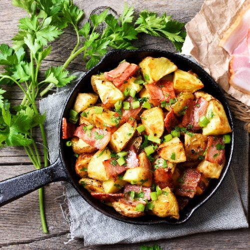 A flatlay picture of roasted potato in frying pan