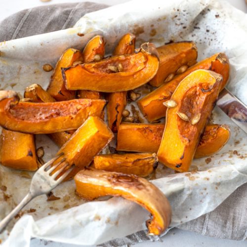 Roasted squash in a baking tray