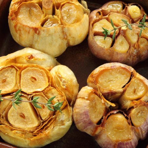 Fresh roasted garlic with olive oil and spices.