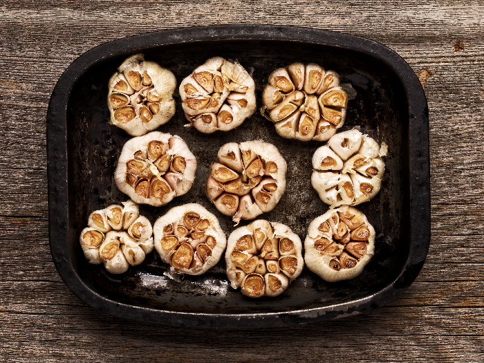 Close up of rustic roasted garlic