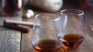 Two glasses with rum in them