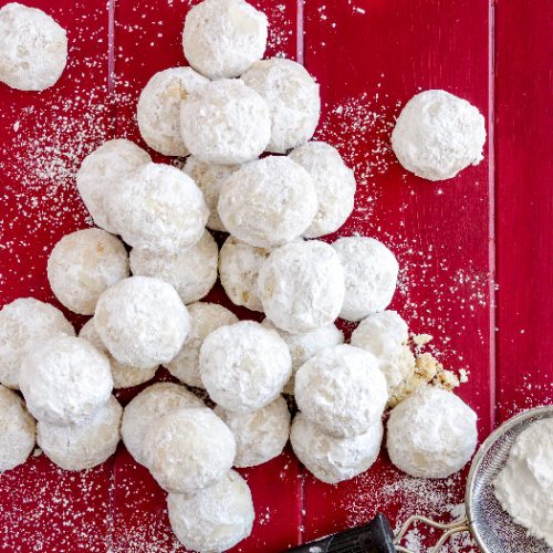 Tea cookies rolled in powdered sugar, also known as Russian tea cakes