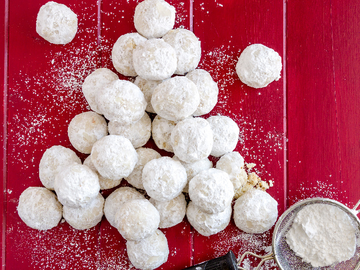 Tea cookies rolled in powdered sugar, also known as Russian tea cakes