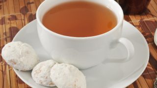 A cup of Russian tea with tea cake cookies