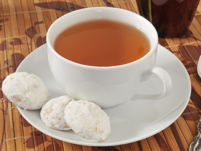 A cup of Russian tea with tea cake cookies