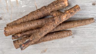 Salsify roots on a wooden surface