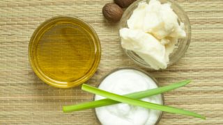 Shea nuts, oil, butter, and cream kept atop a can mattress