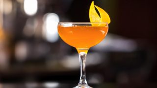 Sidecar cocktail with a lemon twist