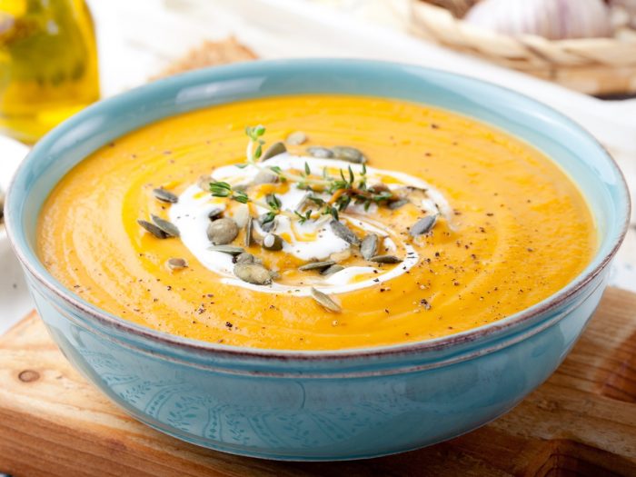 A close-up shot of fresh homemade tomato basil soup