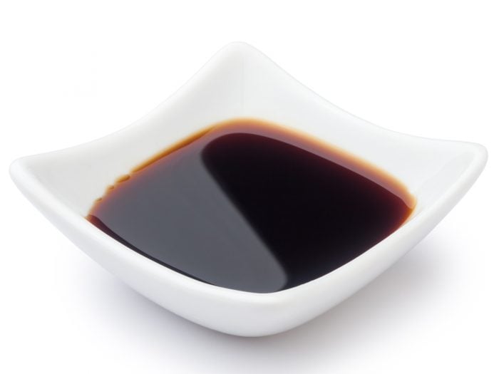 A close-up image of soy sauce in a bowl