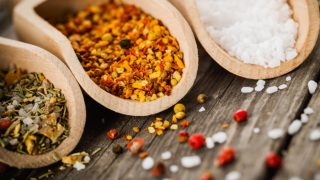 A combination of spices on spoons