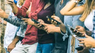 Teenagers and young people using cellphones