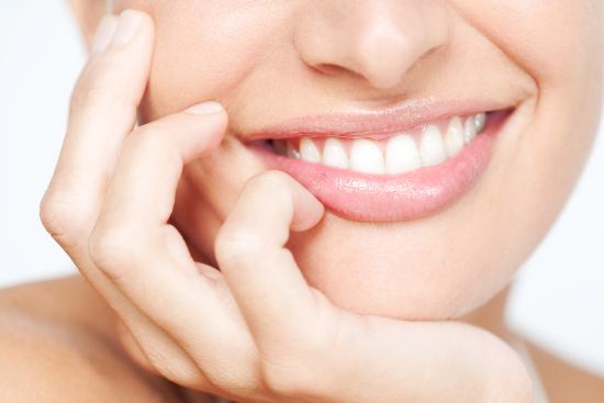 Close-up of a smiling woman's teeth